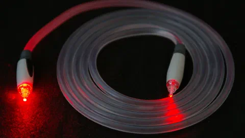 Illuminated optical fibre
